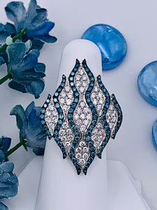 18 Karat White Gold Blue and White Diamond Ring