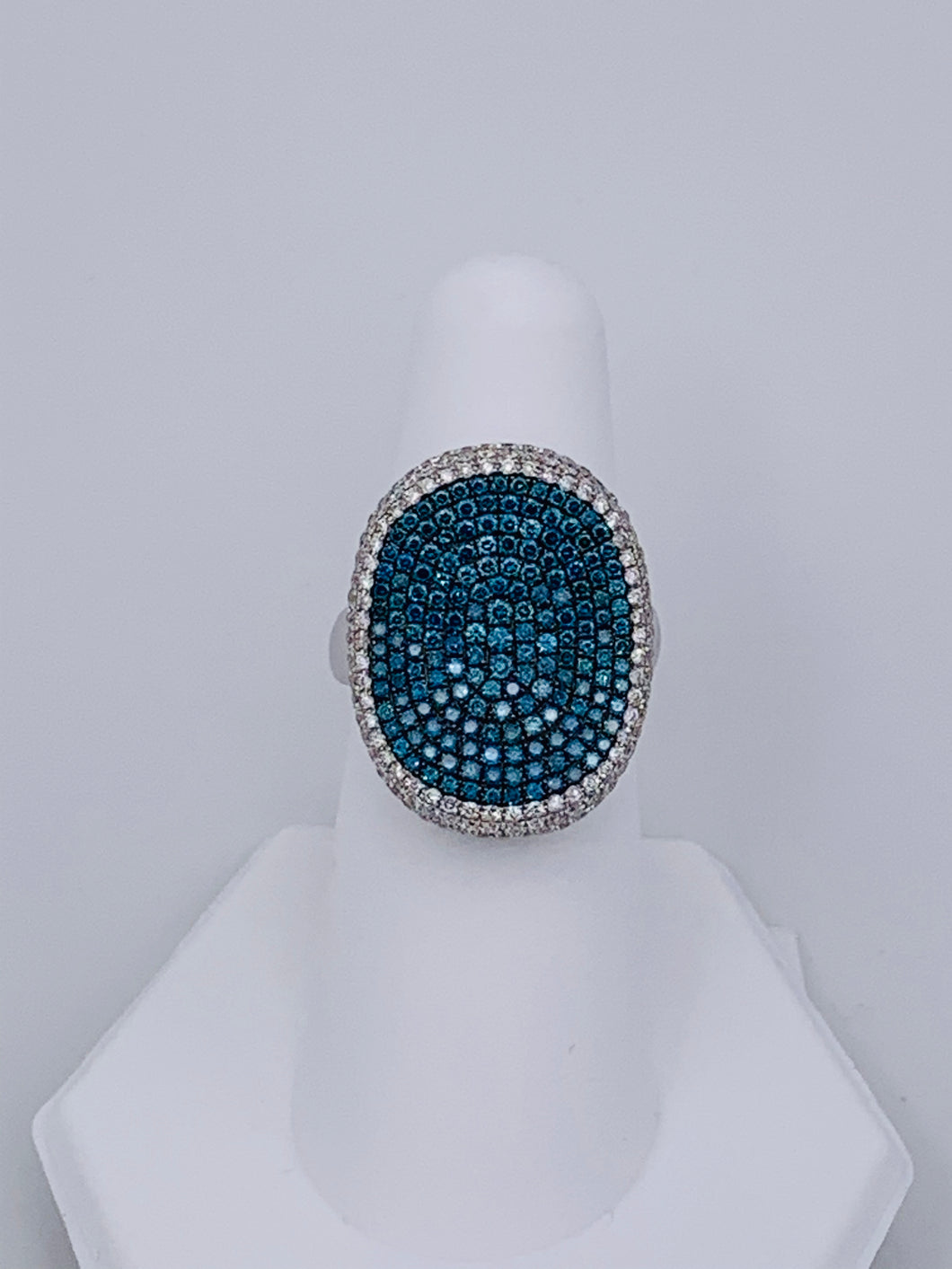 18 Karat White Gold Concave Blue and White Diamond Ring
